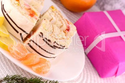 sweet cake on white plate and fruits