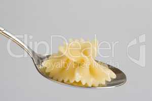 Farfalle and spoon