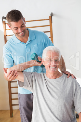 Senior man training with his coach