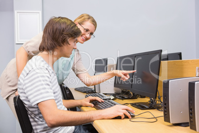 Student working on computer in classroom