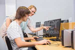 Student working on computer in classroom