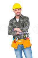 Smiling handyman wearing tool belt