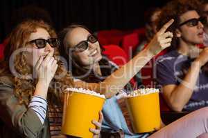 Young friends watching a 3d film