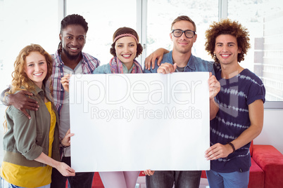 Fashion students smiling at camera together