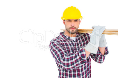 Handyman holding wood planks