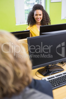 Student working on computer in classroom