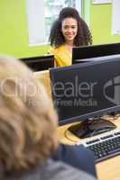 Student working on computer in classroom