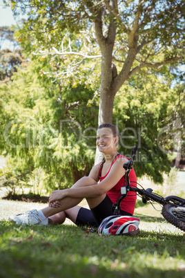 Fit woman with her bike