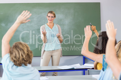 Teacher teaching students in class