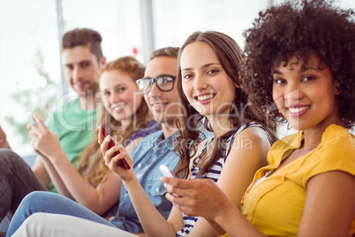 Fashion students smiling at camera