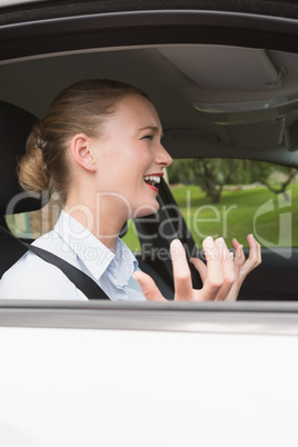 Young businesswoman experiencing road rage