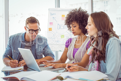 Fashion students using computer