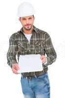 Smiling manual worker giving clipboard for signature