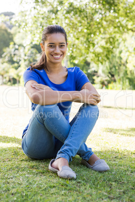 Pretty woman sitting in the park