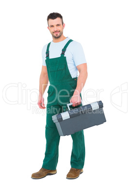 Repairman holding toolbox