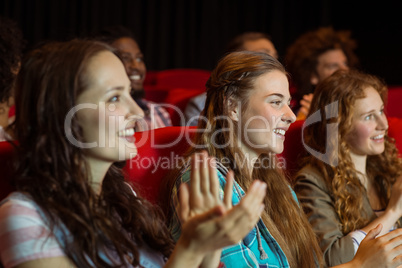Young friends watching a film Young friends watching a film