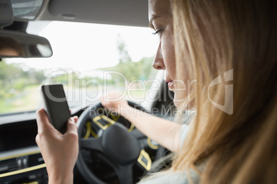 Young woman using the phone