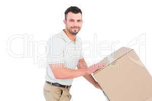 Delivery man pushing trolley of boxes