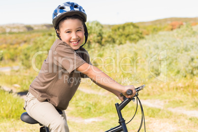 Little boy on a bike ride