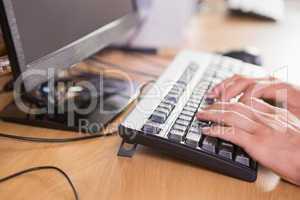 Student using computer in classroom