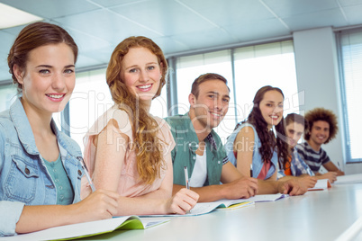 Fashion students smiling at camera