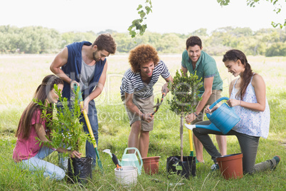 Happy friends gardening for the community