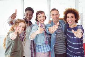 Fashion students smiling at camera together