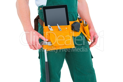 Construction worker wearing tools belt