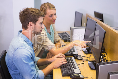 Students working on computer together