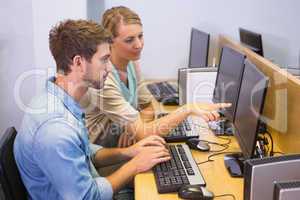 Students working on computer together