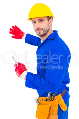 Handyman holding spanner