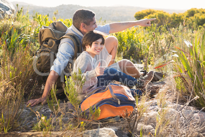 Father and son hiking in the mountains