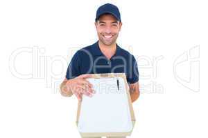 Happy delivery man with package and clipboard