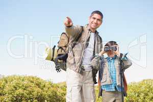 Father and son hiking in the mountains