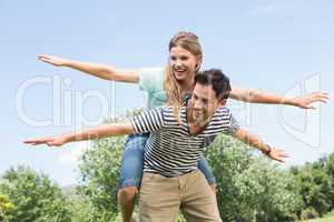 Cute couple having fun in park