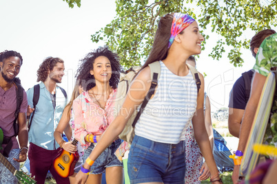 Young friends arriving at their campsite