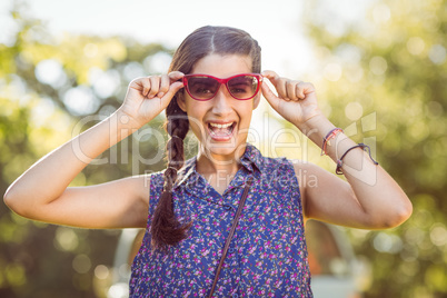 Pretty hipster smiling at camera