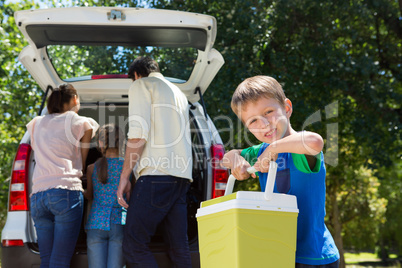 Happy family getting ready for road trip