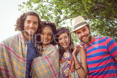 Happy hipsters smiling at camera