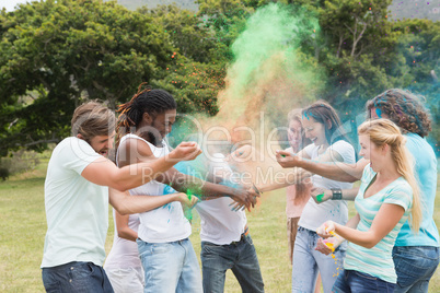 Friends having fun with powder paint