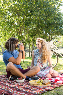 Cute couple having a picnic