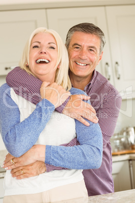 Happy mature couple smiling together