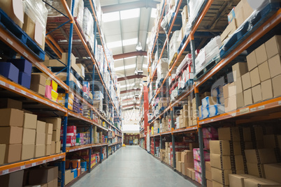 Shelves with boxes in warehouse