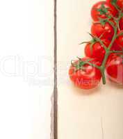 fresh cherry tomatoes on a cluster