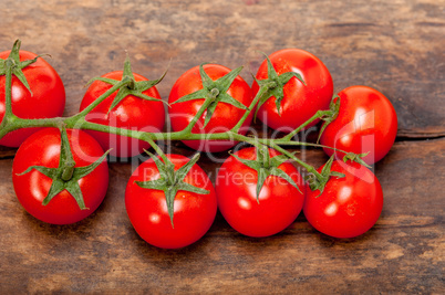 fresh cherry tomatoes on a cluster