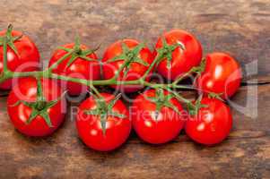 fresh cherry tomatoes on a cluster