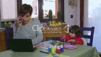 Business Woman Multitasking Mom Working At Home And Child Painting
