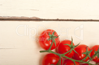 fresh cherry tomatoes on a cluster