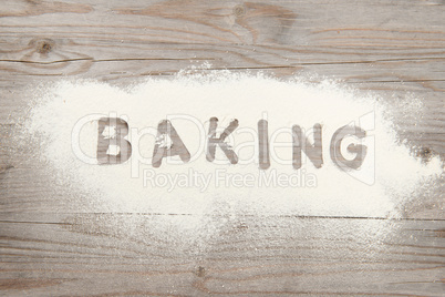 Word baking written in flour