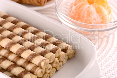 sweet cake on white plate and fruits